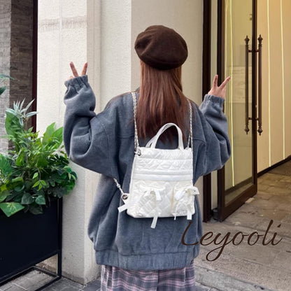Quilted Chain Backpack: Elegant White Puffer Bag