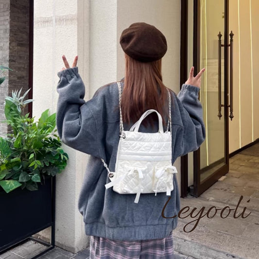 Quilted Chain Backpack: Elegant White Puffer Bag